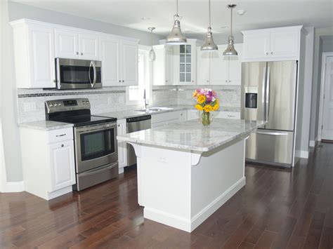 kitchens with white cabinets and stainless steel appliances|mixing white and stainless appliances.